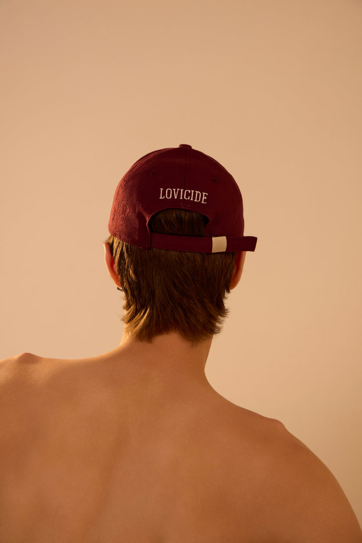 The Lovicide bold curve cap